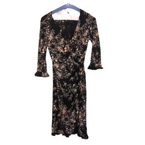 Form fitting flattering beautiful v neck tapered to one side dress